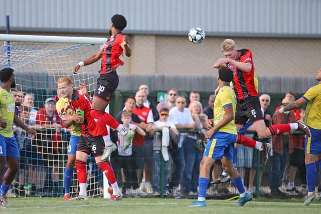 Harvey Peters heads home Kettering's second goal (Picture: Peter Short)
