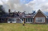 Firefighters tackle the fire in the home in Northampton Road, Rushden/NFRS