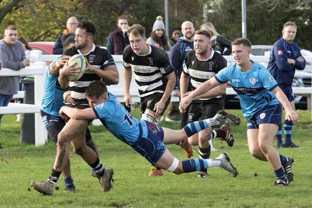 Action from Rushden & Higham's victory over St Neots at Manor Park