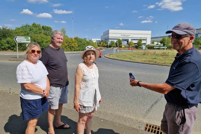 Desborough l-r Tina Wood, husband Dave Wood, Hilary Chapman and husband David Chapman with a sound meter at the Great Bear roundabout near their home/National World