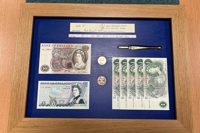 Gent Glass celebrate employee with 50 years' service: Bob Binder was presented with a case containing his 1974 wage (£20.04)/ Gent Glass