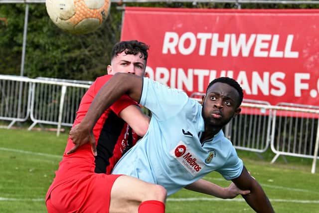 Action from Rothwell Corinthians' 2-1 home defeat to Rugby Town last weekend. Picture by Martin Pulley