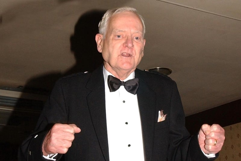 Ian McLean addresses the haggis at the Grampian's Burns supper in 2004