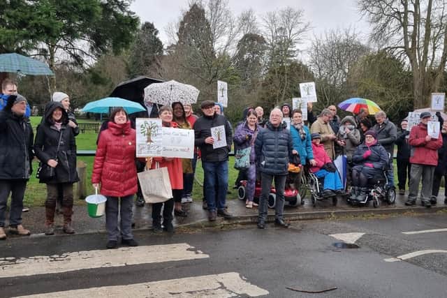 Campaigners stood in the rain to protest