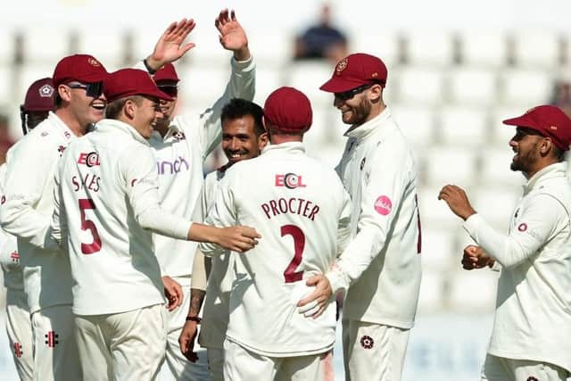 Yuzvendra Chahal of Northamptonshire celebrates with team mates after taking the wicket of Rehan Ahmed (Photo by David Rogers/Getty Images)