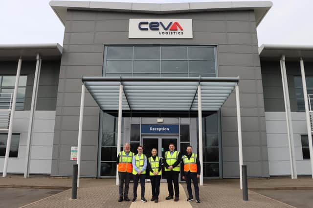 Rosie Wrighting MP with staff outside CEVA Logistics in Kettering/CEVA Logistics
