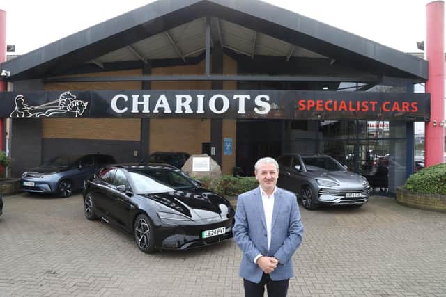 Franco Santoro outside his garage in Kettering/National World