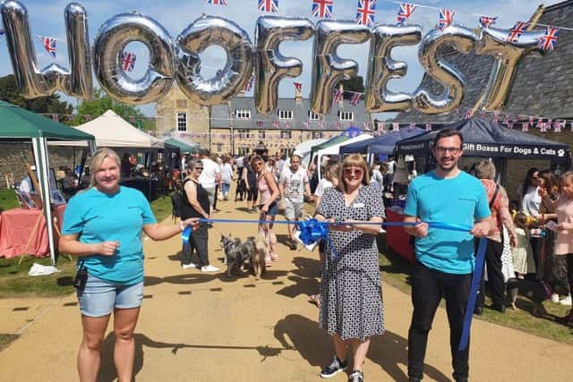 Nadine Berger, Cllr Helen Howell, Jack Pishhorn opening last year's Woof Fest