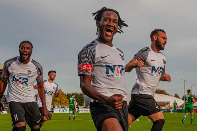 Tsaguim Florian celebrates his goal during Corby Town's 3-0 win over Dereham Town last weekend. Picture by Jim Darrah