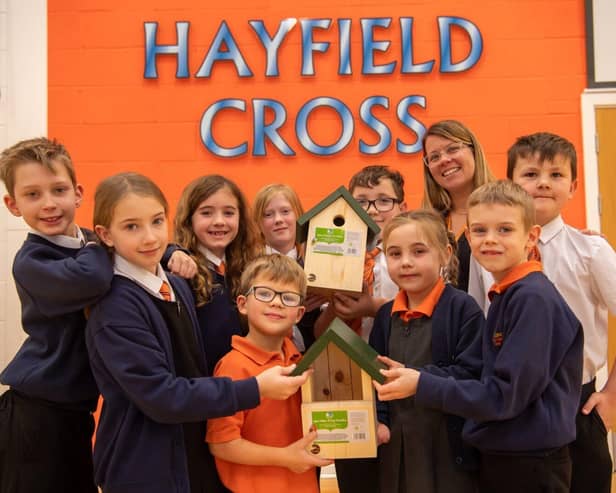 Hayfield Cross C of E Primary School receiving their nest-boxes from Barratt Homes