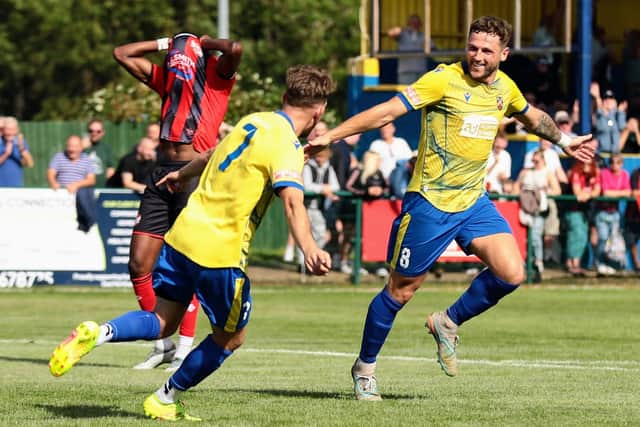 Wellingborough's Lloyd Buckby celebrates firing his side into a 1-0 lead against Kettering Town (Picture: Rob Webb)