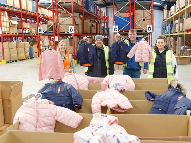 Tesco met with the Salvation Army and Fareshare at the Salvation Army’s depot in Wollaston to handover the warm clothing