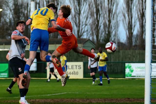 Will Jones heads home Wellingborough Town's second goal in their 4-1 win over Loughborough Students (Picture: Rob Webb)