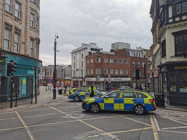 The scene in Northampton town centre today (Tuesday) as police and bomb squad units deal with "suspicious object" found in doorway near Market Square