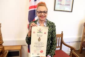 Anita Neil with her scroll