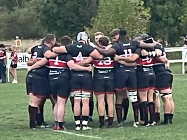The Oundle players huddle up ahead of their opening-day success. Picture courtesy of Oundle RUFC