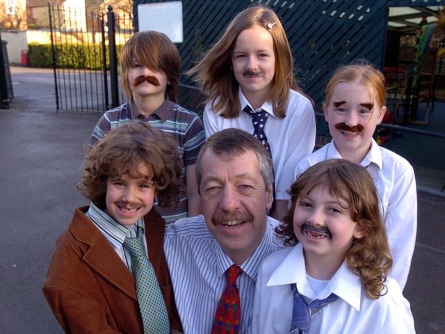 Kettering, Hawthorn Community Primary School, retirement of Head Teacher Richard Hall, marked by dress up as Richard Hall day. Mr Hall with Harvey Reed, 10, Molly Keenan, 10, Amy Ball, 9, George Blatherwick, 7, and Annabel Sherratt, 6. 2008
