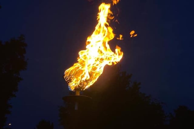 The beacon is lit at Corby's ceremony