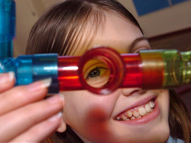 Holly Scheunig, 13, gets to grips with a puzzle during a maths challenge day, February 2008