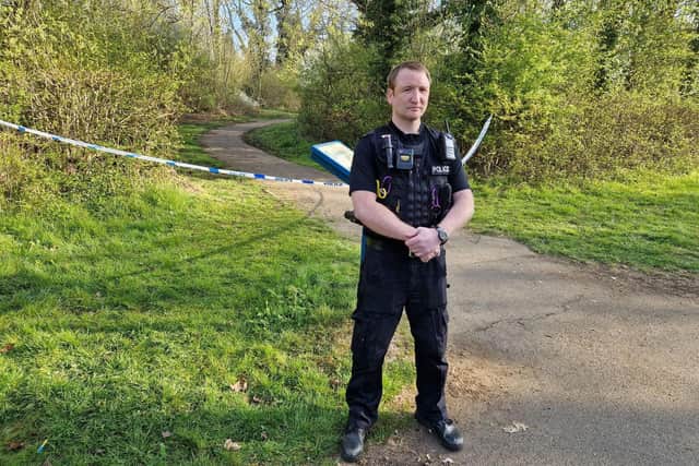 Police guard woodland in Corby after a teenager was shot/National World