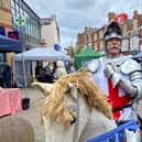 People attend Rushden's St George's Day market on Saturday