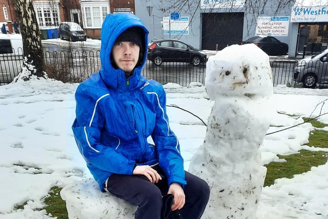 Ryan with his snowman in Bowling Green Road, Kettering, as pictured by Margaret Doherty