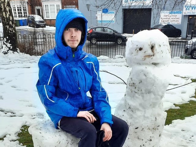 Ryan with his snowman in Bowling Green Road, Kettering, as pictured by Margaret Doherty