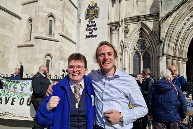 Marion Turner-Hawes with Paul Powlesland - a barrister who climbed one of the lime trees to prevent its felling - outside the Royal Courts of Justice in London/National World