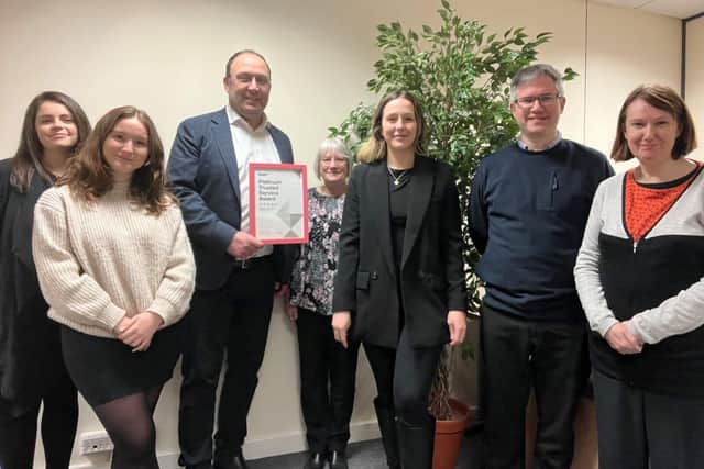 The HR Solutions team with the Feefo Platinum Award