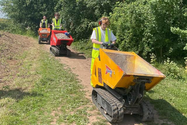Students from Derby College were among those taking part in the improvement work