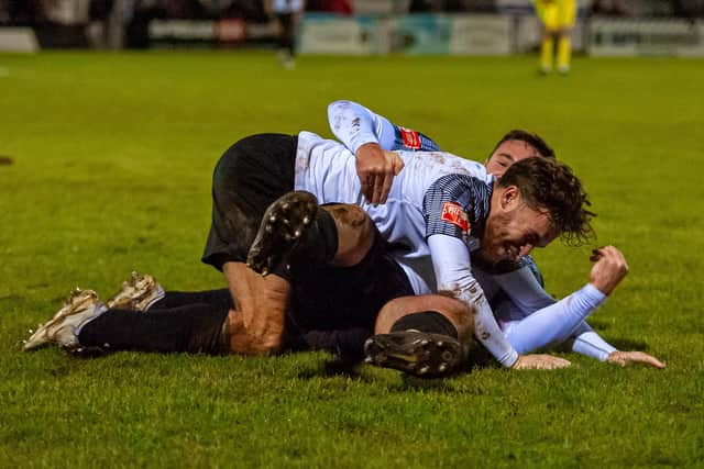 Corby celebrate Dilan Edge's goal that made the score 3-3 (Picture: Jim Darrah)