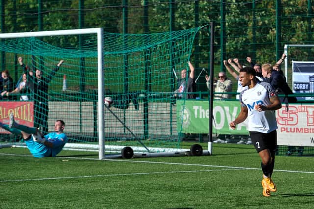 Kalern Thomas celebrates his goal during Corby Town's 3-3 draw at Bedworth United. Pictures by Jim Darrah