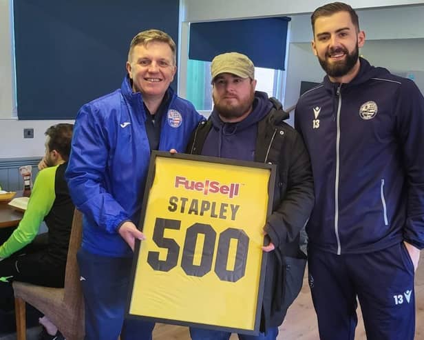 Scott Stapley received a special shirt from Chris Nunn and Dean Snedker having watched every one of AFC Rushden & Diamonds' competitive games since their formation