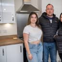 BN - SGB-34113 - The Dinu family in their kitchen inside their brand new home