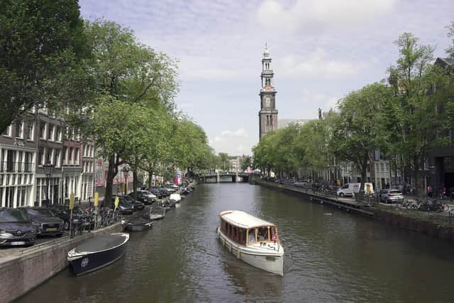 Take a boat ride along The Prinsengracht Canal