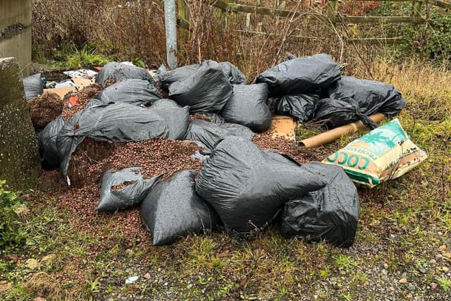 One of the piles of flytipped cannabis farm waste between Corby and Kettering