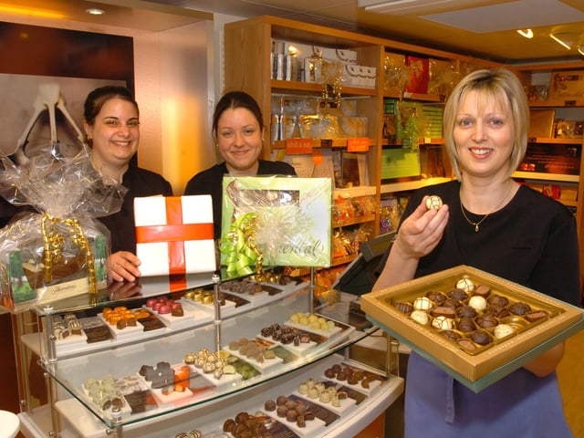 Kettering ,High Street, Thorntons shop opens,l to r,Kathryn Tucker ,Caroline Pegg and manager Lynda Cave June 2006
