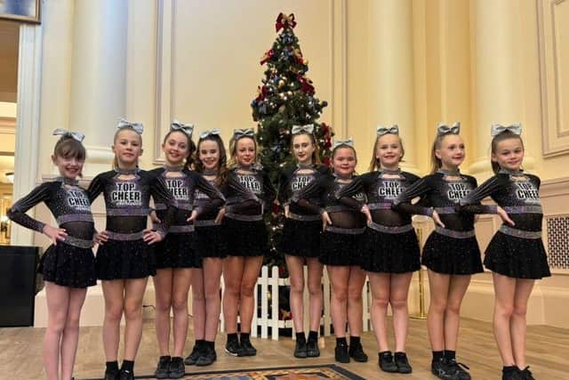 The Cosmic Under 12 Team from Top Cheer Athletics