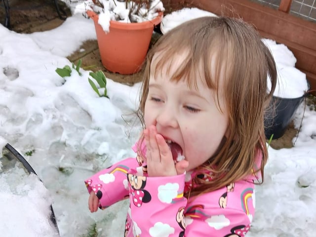 Natalie Watson sent in this picture of her granddaughter enjoying eating the snow!