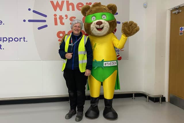 Left Corby Company Shop store manager Judy Bradshaw and right Blade the mascot for the Children's Air Ambulance's club, #TheCrew