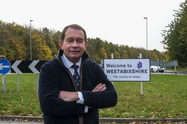 Philip Hollobone MP in front of a ‘Welcome to Weetabixshire’ sign which has been erected in the Northamptonshire town of Burton Latimer to mark the new proposed county lines of Weetabixshire (Photo credit: Michael Leckie/PA Wire)