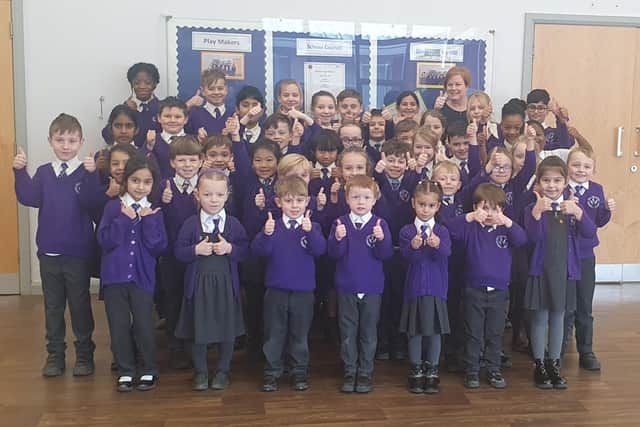 Pupils and staff at Hall Meadow Primary School celebrate