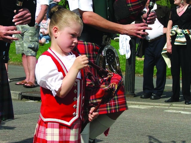 Corby Highland Gathering: A young piper joining in the fun.