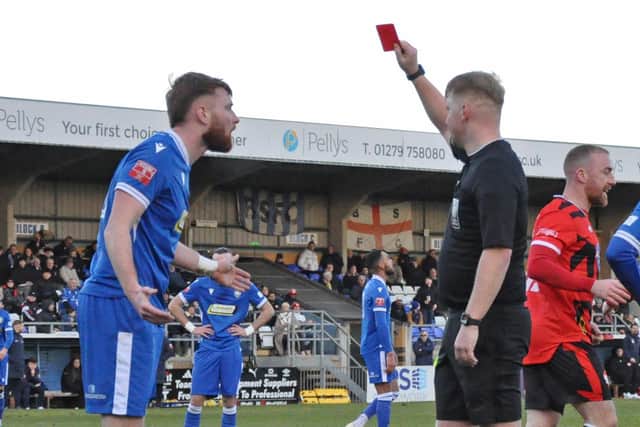 Charlie Johnson is red-carded after his foul on Wes York (Picture: Peter Short)