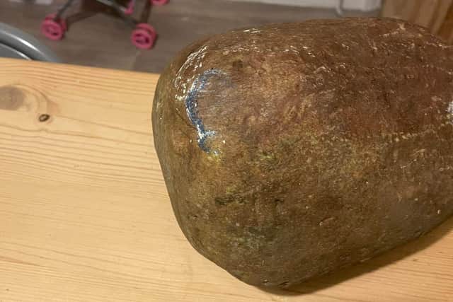 Police are launching an urgent investigation after a massive boulder was hurled through the front window of a terrified family’s home in Desborough.