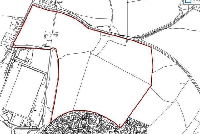 The red line shows the site of where 700 homes are to be built