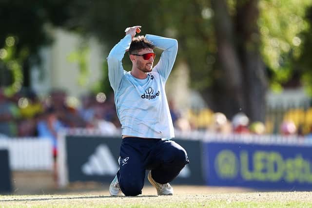 Rob Keogh rues a missed run out chance