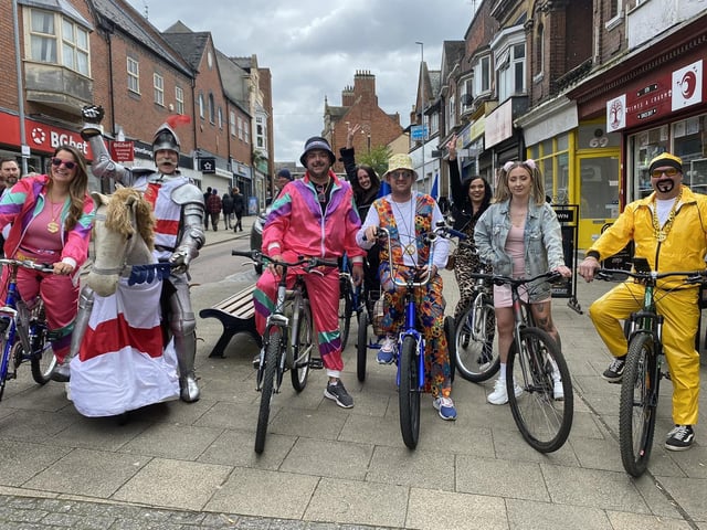 People attend Rushden's St George's Day market on Saturday