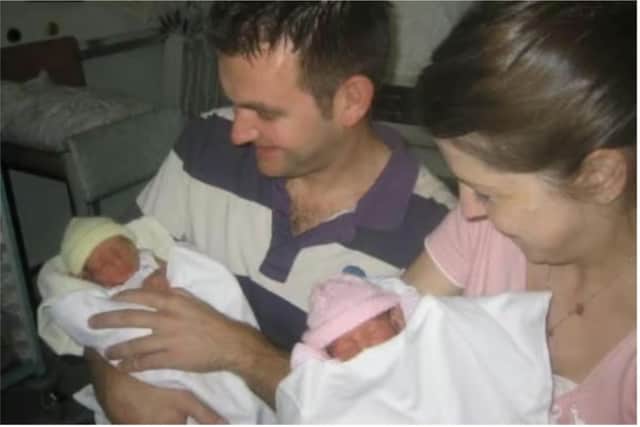 Tim and Naomi Cooper with Willow (yellow hat) and Bronte (pink hat) in Kettering General Hospital's special care baby unit / UGC
