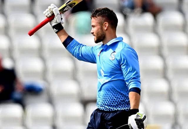 Lewis McManus celebrates scoring his first century as a Northants player in last season's One Day Cup clash with Derbyshire